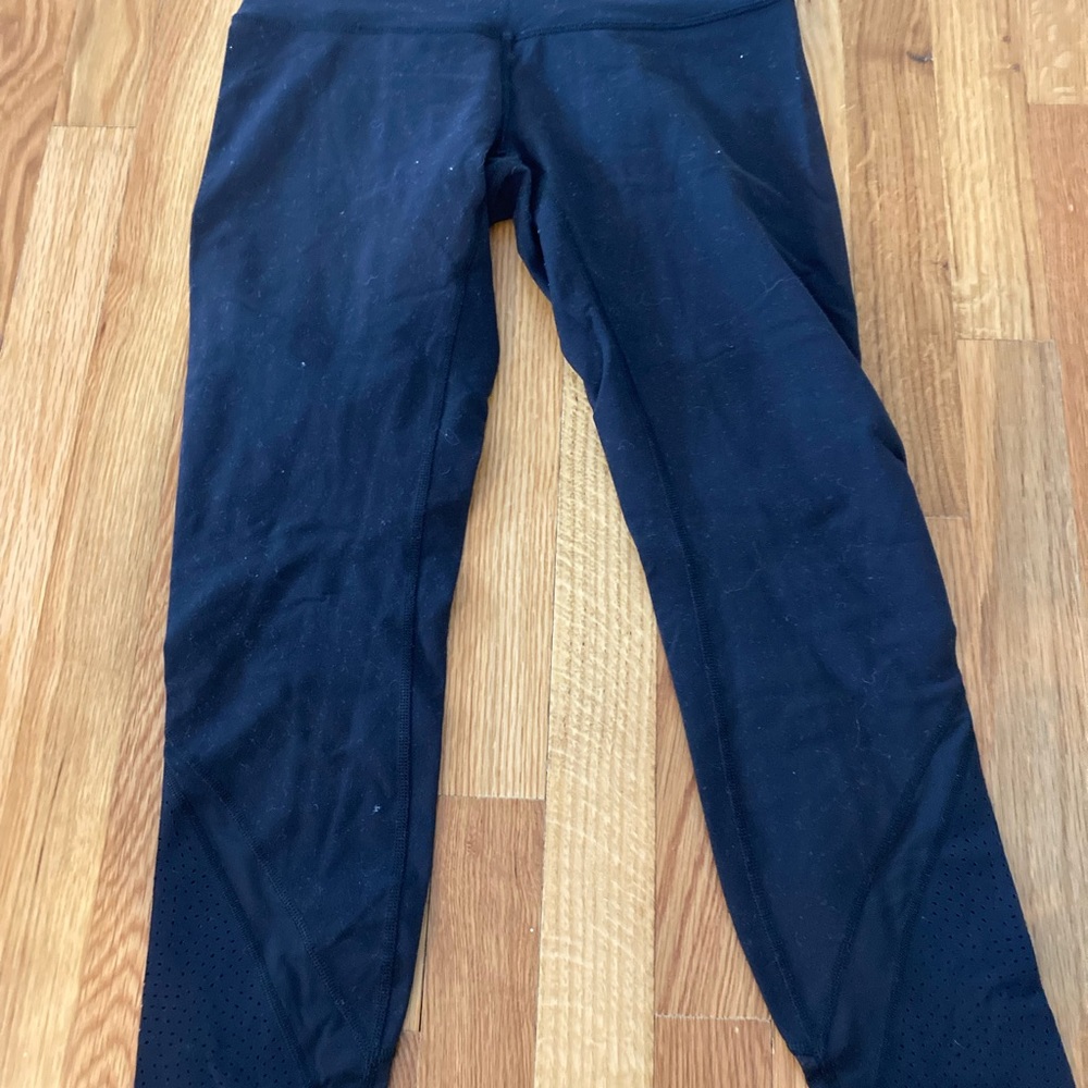 Lululemon Black sz8 leggings with mesh and dot detail at bottom